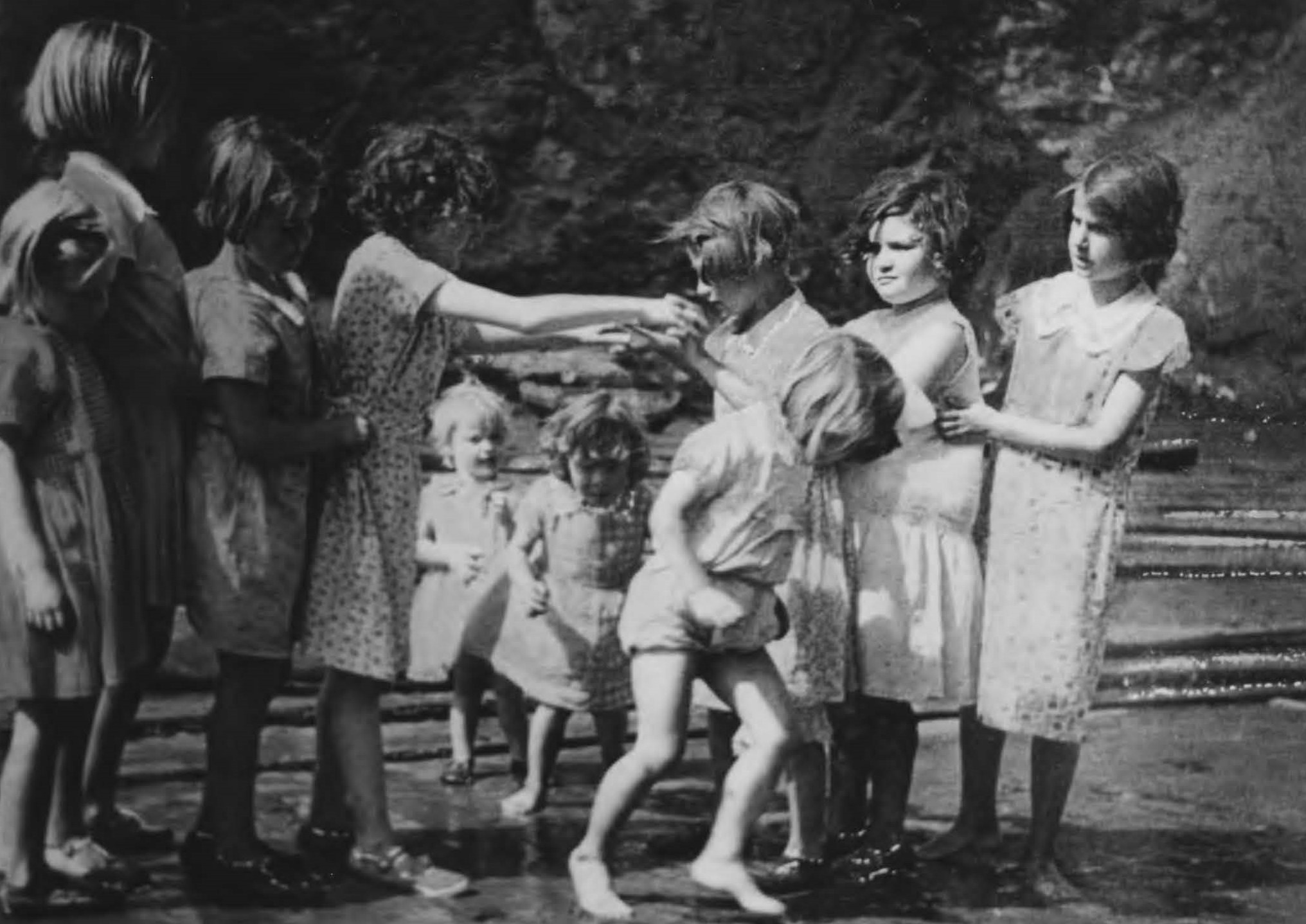 Playing on the beach, c1935