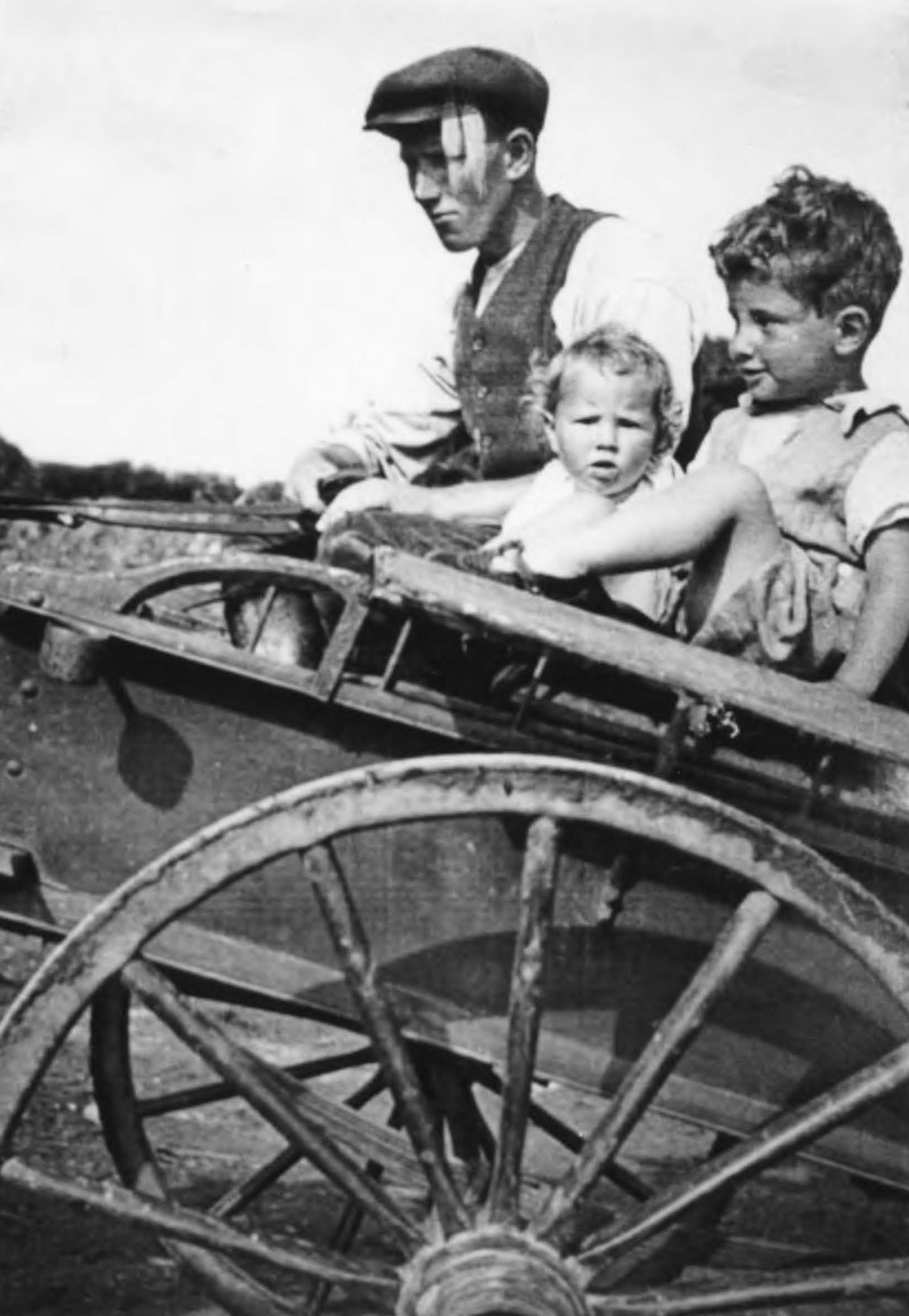 Sam Blake with the Parsons' children in the cart, c 1935