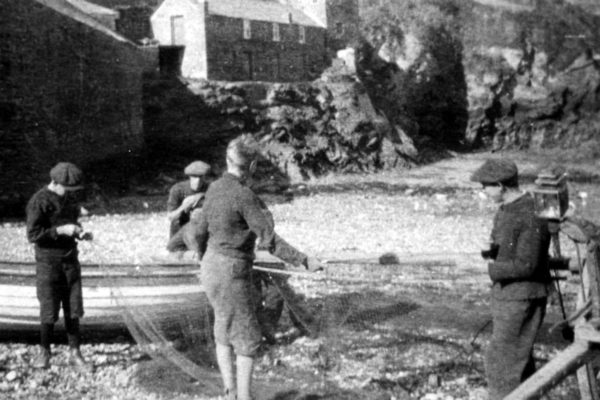 Tending the nets, c1925