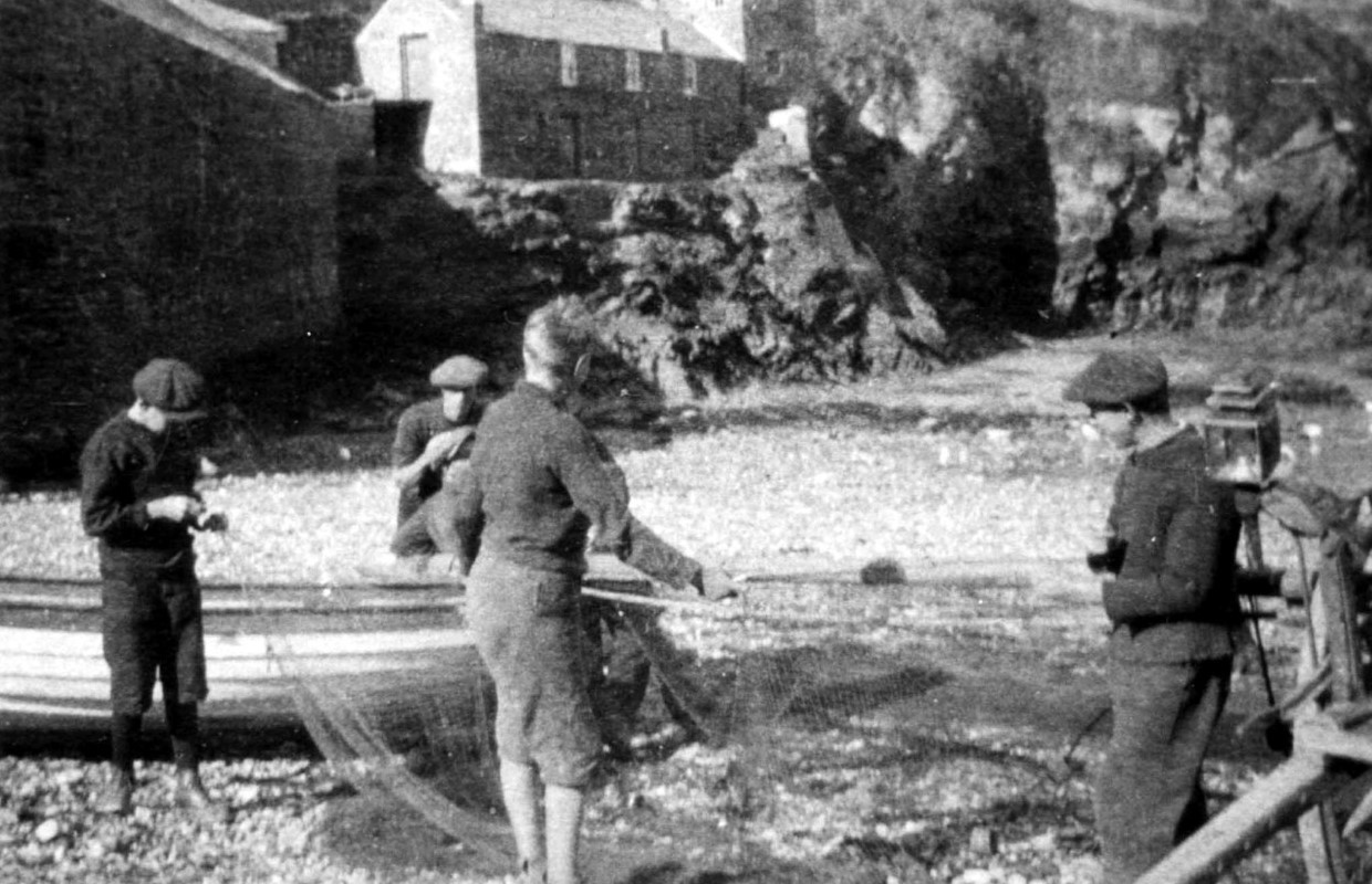 Tending the nets, c1925