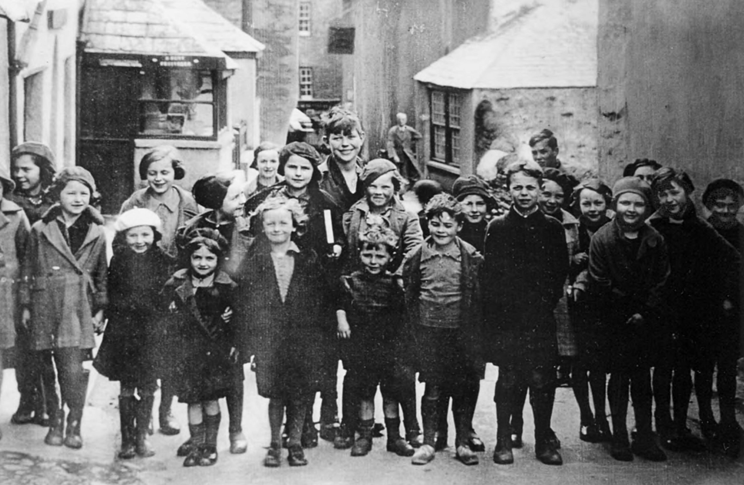 The children just out of school around 1940