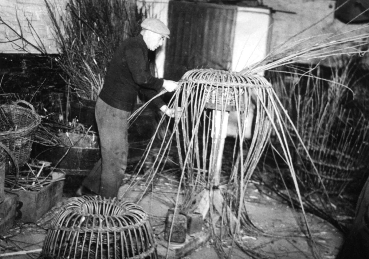 Tom Brown making lobster pots, c1955